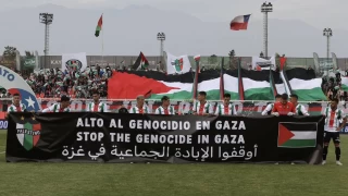 Palestino sahaya "Gazze'de soykrm durdurun" pankartyla kt