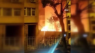 Beikta'ta bina yanarken mahalleli birbirine girdi