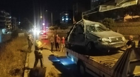 Otomobil takla atarak tarlaya uçtu