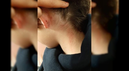 Öğrencisini yerden yere vurdu