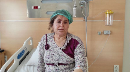 Boşanmakta olan eşinin evini tüfekle bastı