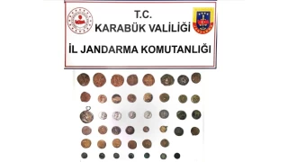 Karabk'te 4 kii 45 sikke ile yakaland