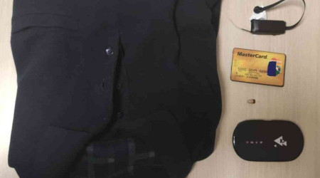 Ehliyet sınavına kameralı kopya düzeneği ile girmeye çalışırken yakalandı